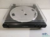 an image of a turntable with a clear plastic cover on top of it