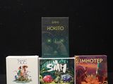three books that are sitting next to each other