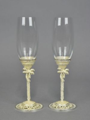 SWAROVSKI - Réunion de deux flûtes, fût à décor de perles et…