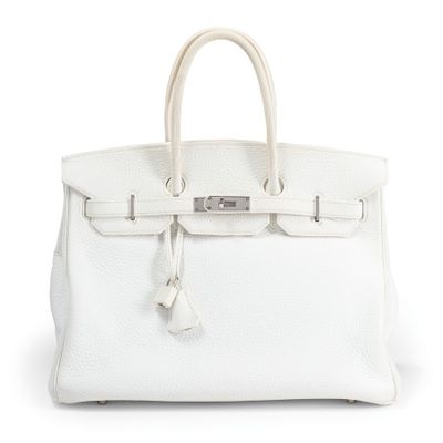 a white leather handbag on a white background