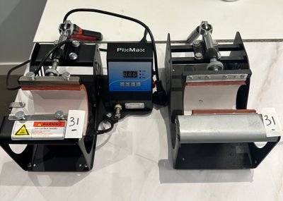 two machines that are sitting on a table