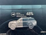 a picture of a car on display in a car showroom