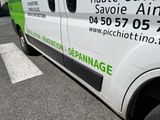 a van that is parked on the side of the road