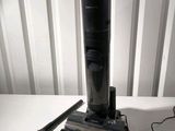 a picture of a vacuum cleaner and a pair of scissors on a table