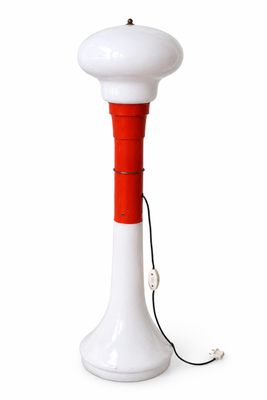 an image of a red and white lamp on a white background