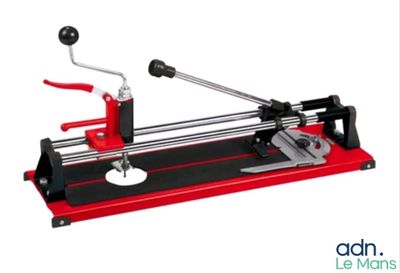 a close up of a red and black machine on a white background
