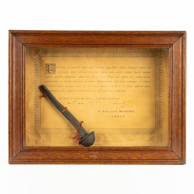 framed picture of a pipe and a letter in a wooden frame