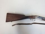 a gun that is laying on a table