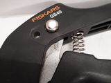 a close up of a pair of pliers on a table