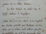 a close up of a piece of paper with writing on it