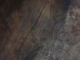 a close up of a piece of wood with a hole in it