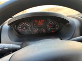dashboard of a car with a steering wheel and a speedometer