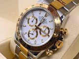a watch that is in a box on the table