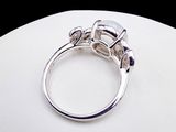 a ring that is sitting on top of a white table