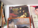 a lot of music books on the shelf