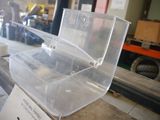a clear plastic box with a lid on a table