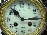 a clock that is sitting on top of a table