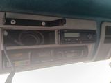 a car dashboard with a radio and other electronics in it