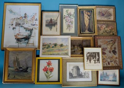 a lot of framed pictures on the wall of this room