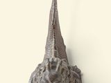 a sculpture of a fish that is on the wall