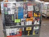 a metal cart with many items in it in a warehouse