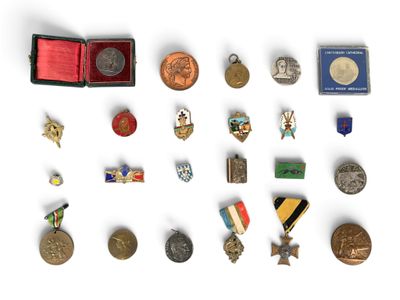 an image of a collection of medals and medals on a white surface