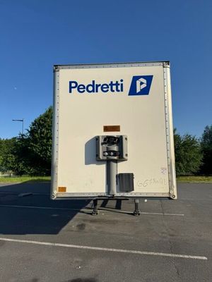 a delivery truck that is parked in a parking lot