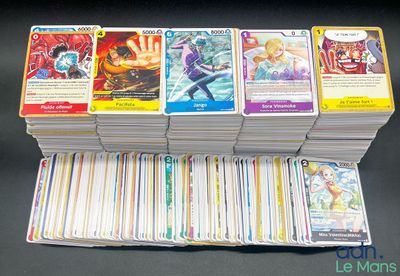 a bunch of cards sitting on top of each other on a table