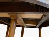 a close up of a wooden table with a metal top