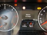 a close up of a car dashboard with various gauges