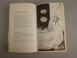 an open book with a picture of a chicken on it