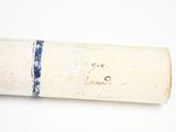 a roll of paper with writing on it sitting on a table