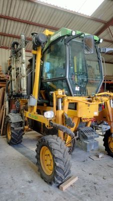 a tractor that is parked inside of a building