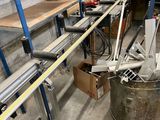 an image of a large metal bucket in a warehouse