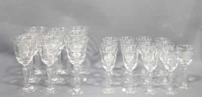 a lot of wine glasses that are sitting on a table