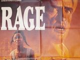 une vieille affiche de cinéma représentant un homme et une femme devant une ville