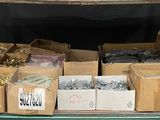 many boxes of assorted items in the back of a truck