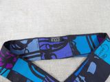 purple, blue, and black neck tie with a picture of a woman