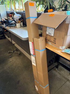 a cardboard box sitting on top of a wooden table