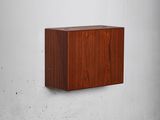 an image of a wall mounted wooden box on a white wall