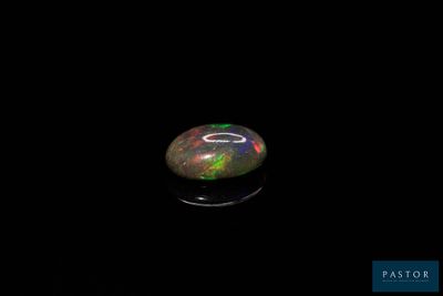 an oplite is shown in the dark with a black background