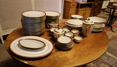 a table with a lot of plates and bowls on it