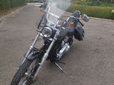 a motorcycle that is parked on the side of the road