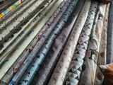 many different types of fabric on a table