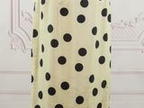 yellow and black polka dot skirt on a mannequin mannequin mannequin mannequin mannequin mannequin mannequin mannequin