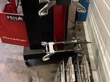 a picture of a machine that is working on a piece of metal