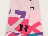 the scarf is pink, blue, and purple with letters on it