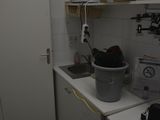 a small kitchen with a sink and a microwave in it