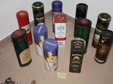many different types of tins on the floor next to each other
