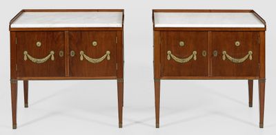 pair of nightstand tables with marble tops and brass handles